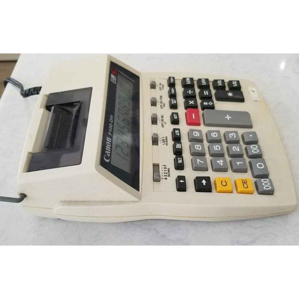 Canon p100-dh 12 characters printing Calculator works